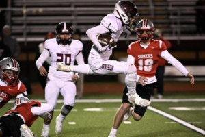 Joe Crupi runs a kickoff back for a touchdown against Somers.